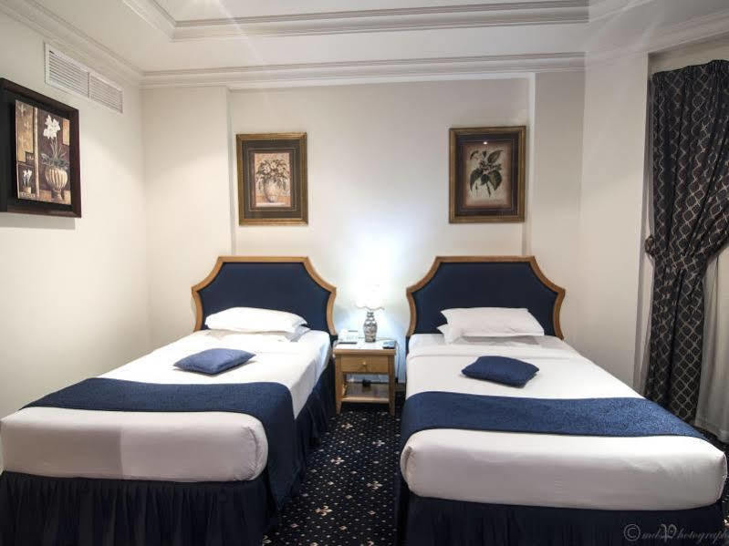 Cayam Hotel Доха Экстерьер фото